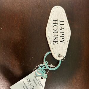“Happy House” keychain
Bnwt